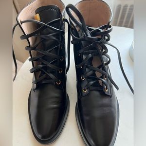 Stuart Weitzman black and gold booties